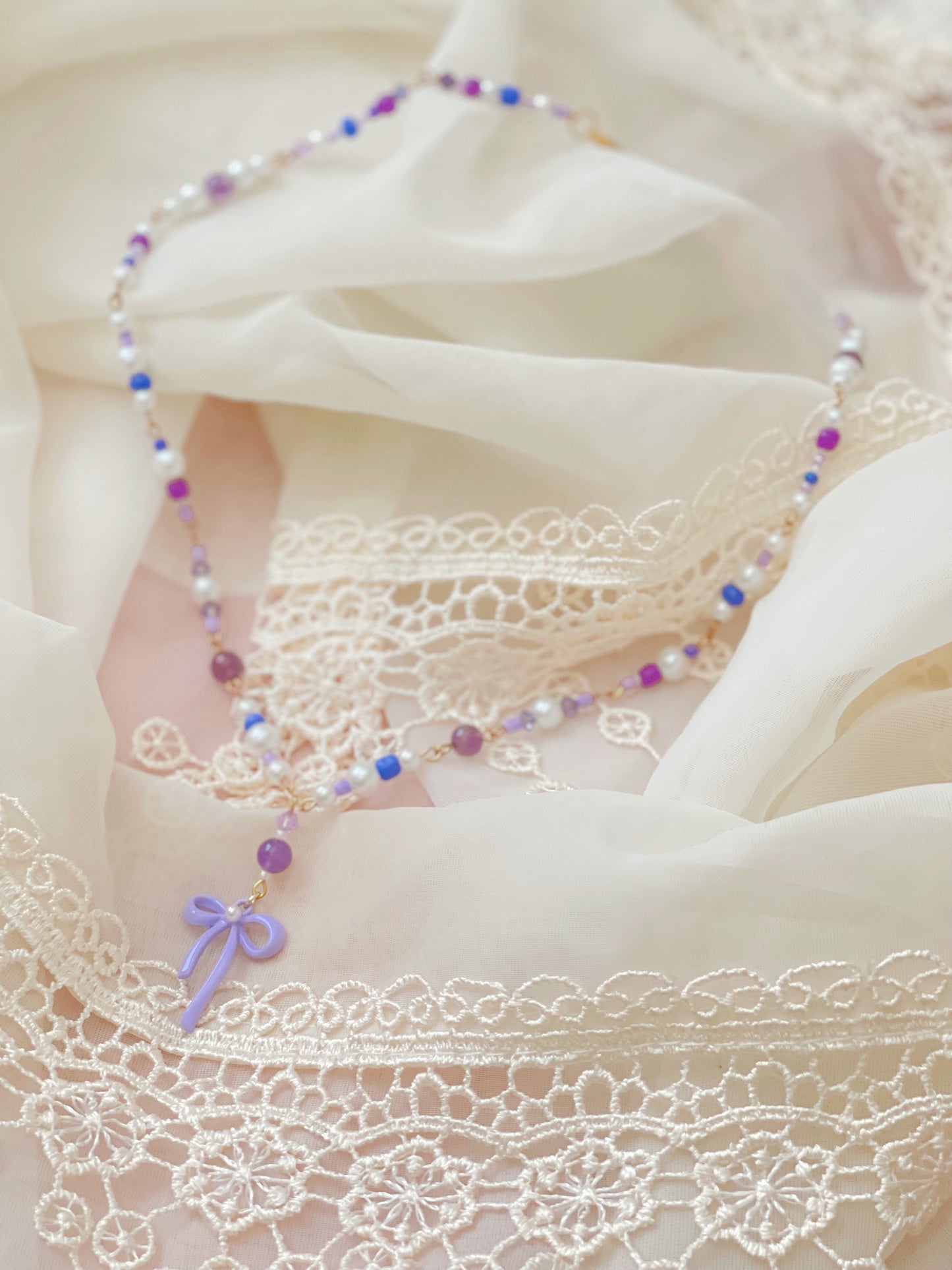 Crystal Bow Necklaces