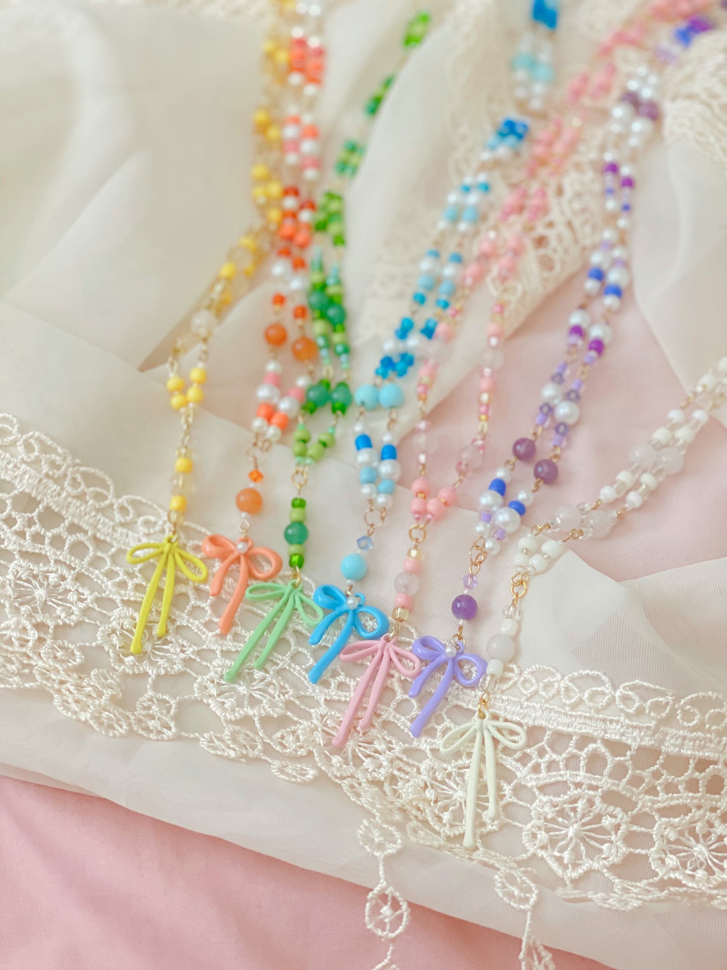 Crystal Bow Necklaces