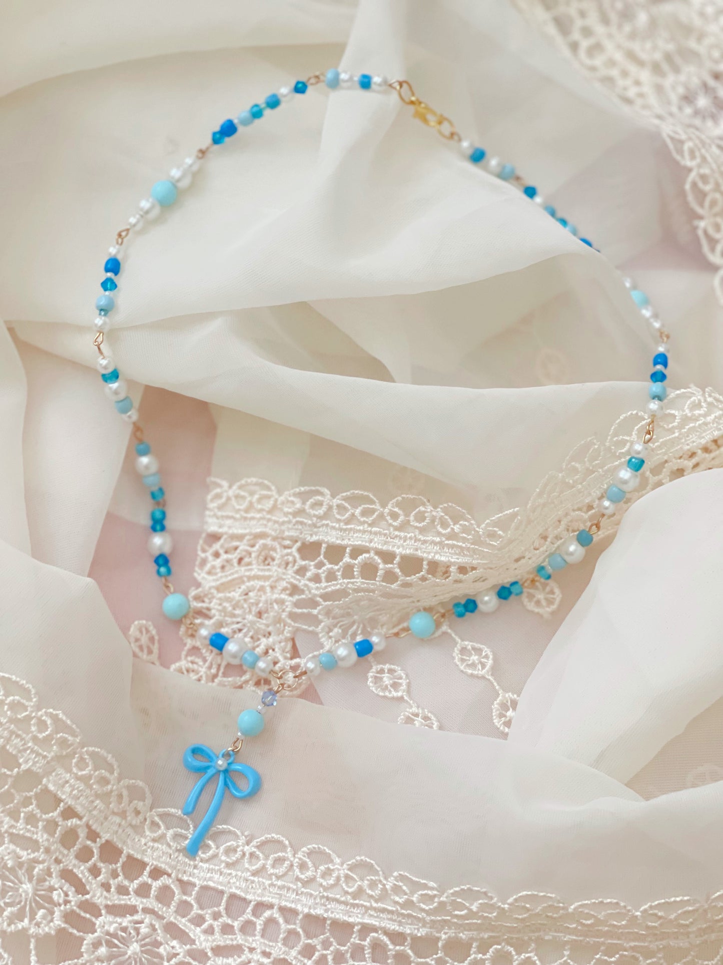 Crystal Bow Necklaces