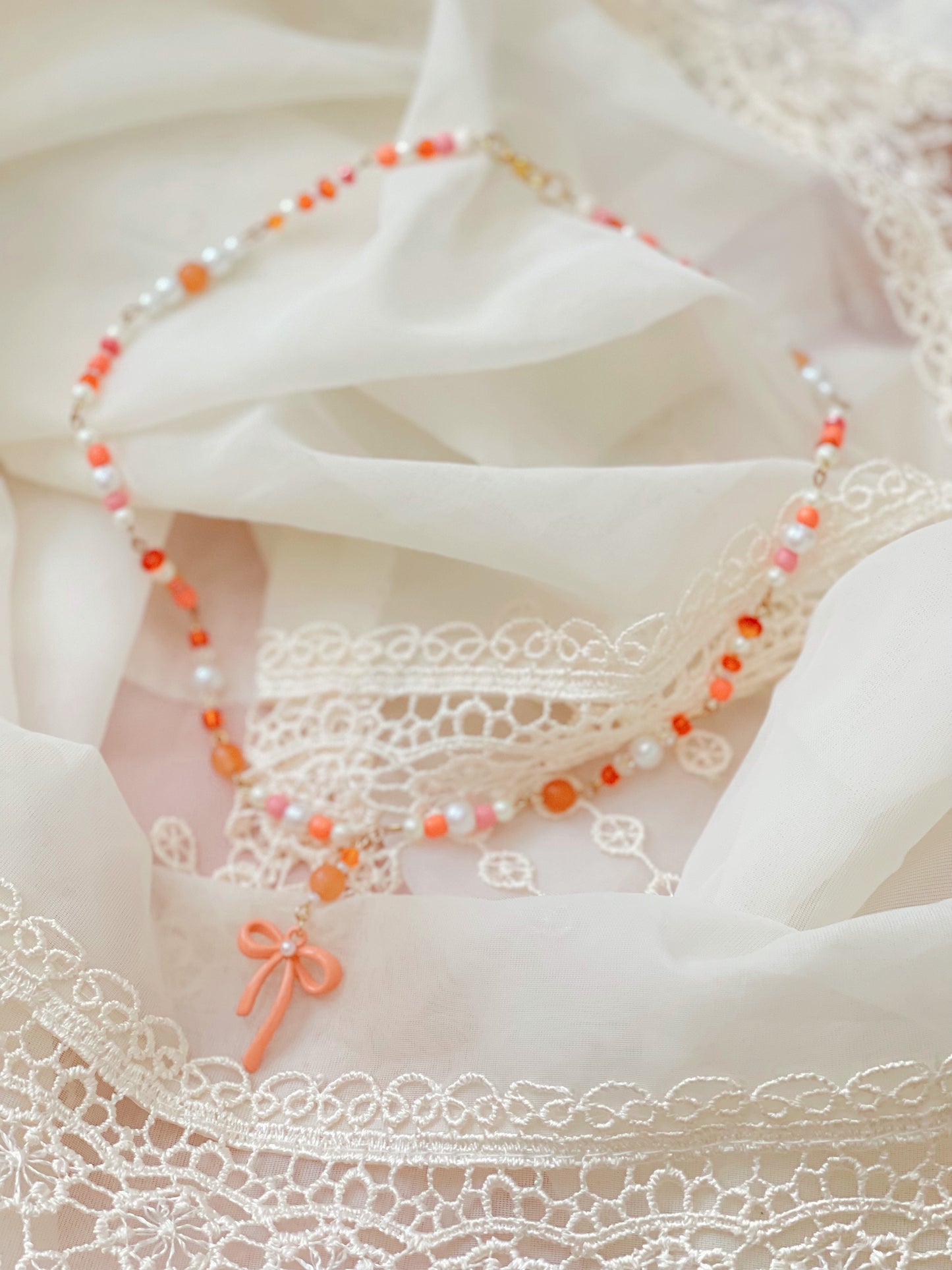 Crystal Bow Necklaces