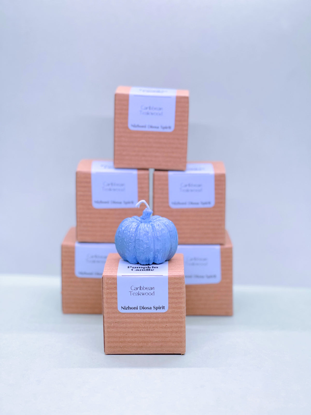 Blue mini pumpkin candle with Caribbean Teakwood scent handcrafted for fall