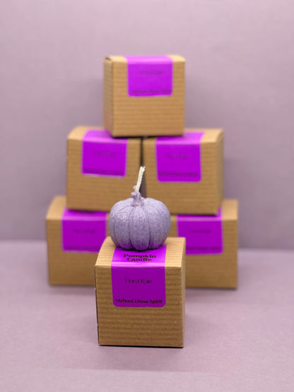 Purple handcrafted mini pumpkin candle in a seasonal autumn color