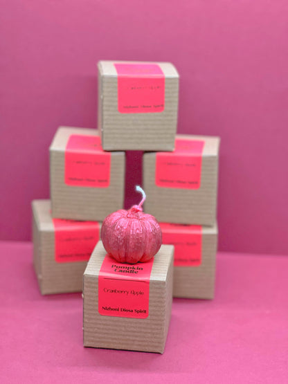 Red mini pumpkin candle with Cranberry Apple scent for cozy autumn evenings