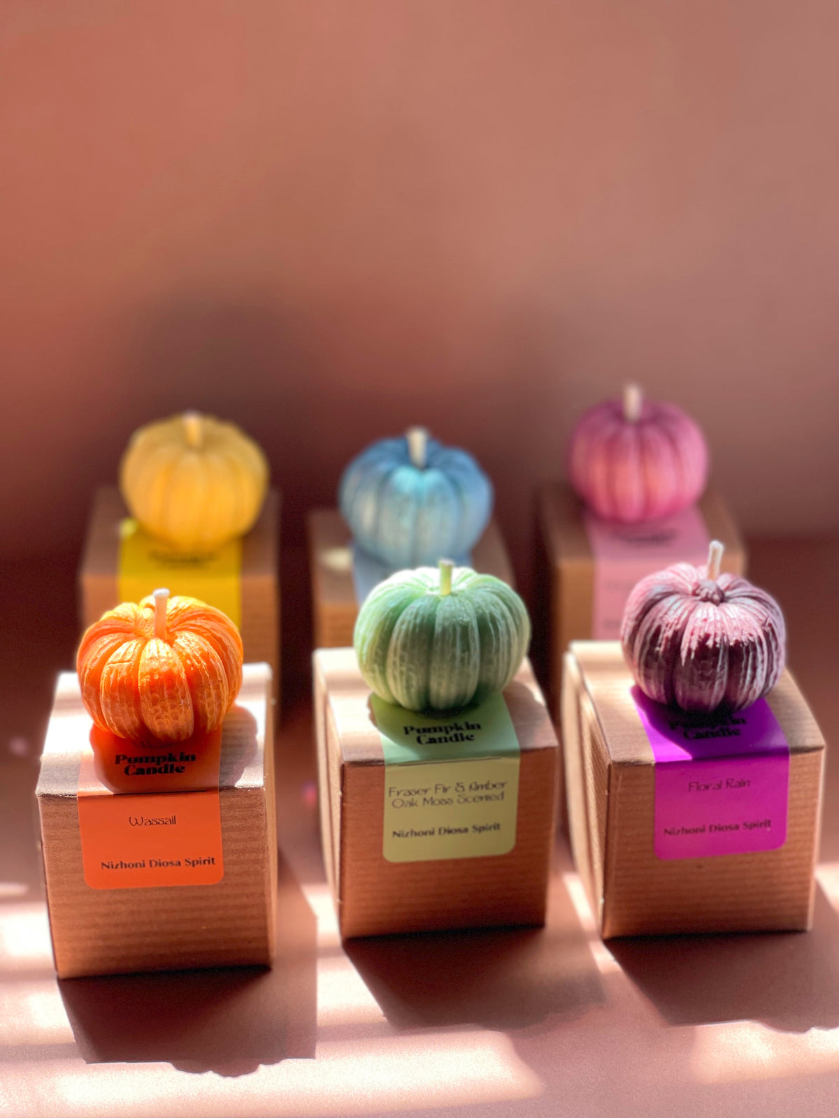 Handcrafted mini pumpkin candle packaged as a unique fall gift